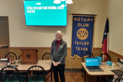 Joan Bohls, a board member and past president of the Rotary’s E-Club Central Texas chapter, was a featured speaker at the regular meeting of the Rotary Club of Taylor Dec. 29.  Both chapters are partnering to fund an oxygen regeneration plant in Liberia. Courtesy photo by the Rev. George Qualley