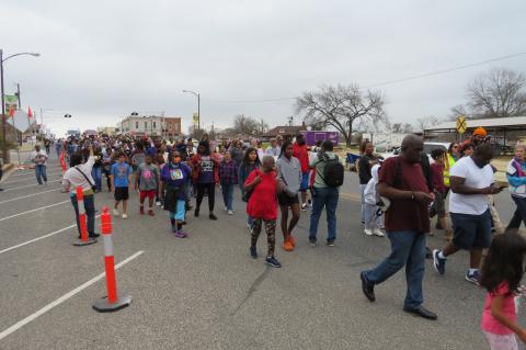 Residents march through Elgin Jan. 16 for the 34th Annual Walk for Peace, Justice, and Equality to celebrate Martin Luther King Jr. Day. Photo by Fernando Castro