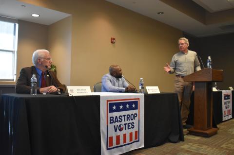 Moderator Charlie Stone (right) explains rules of the Bastrop ISD candidate forum held at the Bastrop Chamber of Commerce in Bastrop April 11 to Billy Moore (left) and Joseph B. Thompson. Photo by Fernando Castro