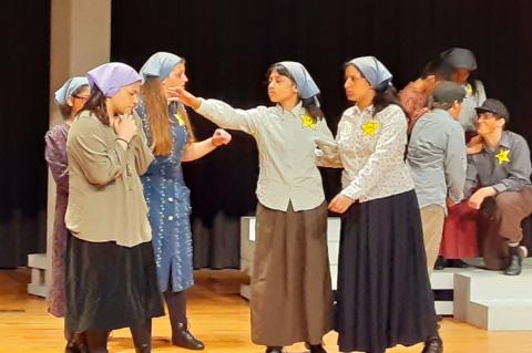 Elgin Middle School theatre actors perform “I Never Saw Another Butterfly,” by Celeste Raspanti, during the One Act Play Festival at the Bastrop Performing Arts Center April 6. Pictured are Caylee Quiroga, Hailey Hill, Ariana Verda and Rebecca Alvarado. Courtesy photo