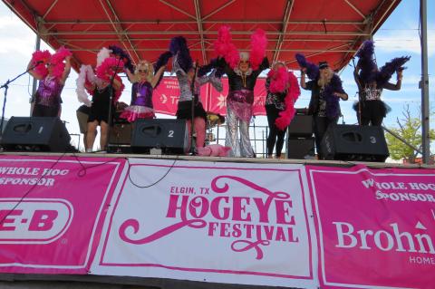 The Sowpremes delights the crowd from a stage at the Hogeye Festival in downtown Elgin Oct. 22. Photo by Fernando Castro