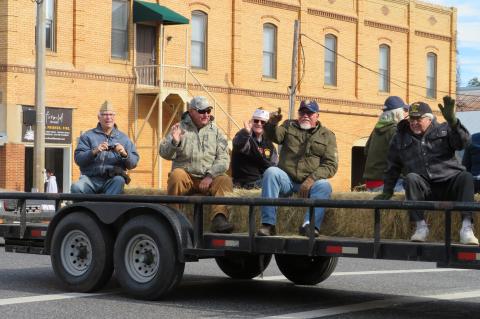 Several area veterans ride along in the Annual Veterans Day Parade in Elgin Nov. 12. Photo by Fernando Castro