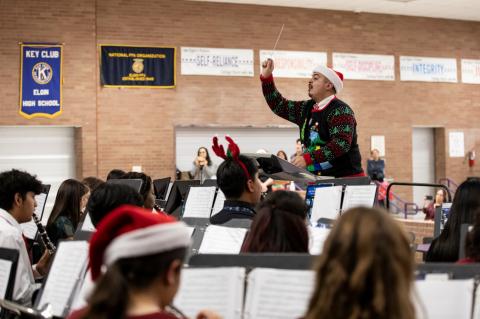Elgin High School Band Director Armando Martinez in his holiday sweater for the Christmas Concert. Photo courtesy Erin Anderson   