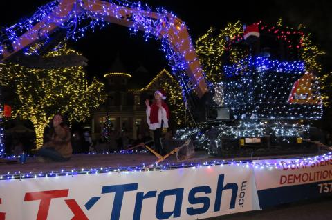 TX Trash floats through Main Street in Elgin Dec. 3 for the Elgin Lighted Parade. The entrant won first place in parade awards. Photo by Fernando Castro