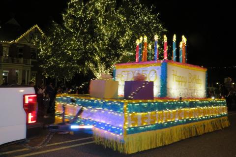 A float celebrating Elgin’s Sesquicentennial goes down Main Street in Elgin Dec. 3. Photo by Fernando Castro