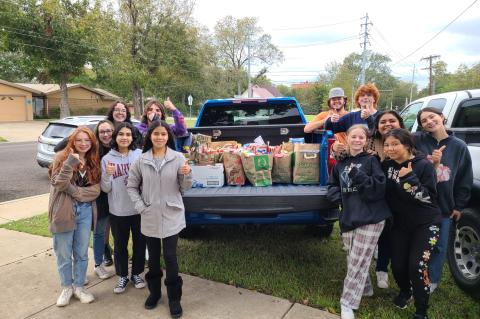 PALS members collect donated food from residents before sorting items into festive Thanksgiving baskets. Photos courtesy of Ian Jaschek