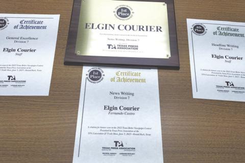 Courier collects awards