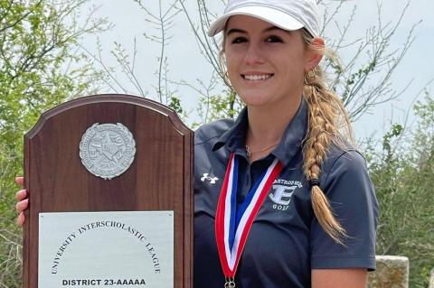 Bastrop High School varsity standout girls golfer Carly Sherman adds some hardware to her trophy case May 15 with a regionals plaque after advancing to the state championship. Photos courtesy of Bastrop ISD
