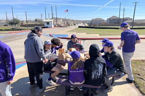 Elgin ISD students enjoy a free curbside lunch at Elgin High School. Photo courtesy of Dr. Jana Rueter