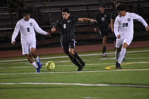 Josue Cervantes charges down field, leading an aggressive offensive attack for the Bears. Photo by Quinn Donoghue