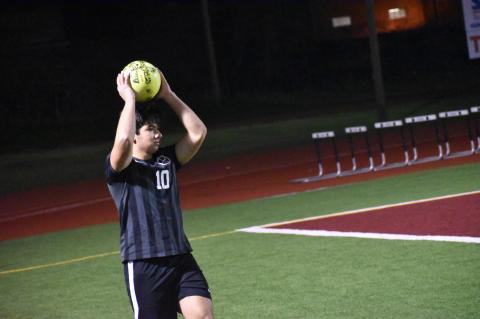 Bastrop’s leading scorer James Ramon prepares to deliver a throw-in pass. Photo by Quinn Donoghue