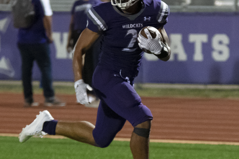 Running back Sebastian Jackson scampering down the sideline for a touchdown.  Photo by Marcial Guajardo  