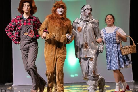 Left to Right: Jaxon Everett Larson, Jake Johnson, Brandon Clear and Isabel Guerra recreate iconic Wizard of Oz characters. Photo by Marcial Guajardo.