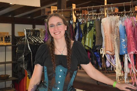 Owner of Faire Treasures, Kitty Vinson, selling Renaissance costumes and other accessories.  Photo by Quinn Donoghue 