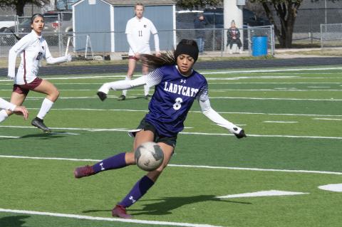 Elgin High School girls varsity soccer junior Kailyn Cook dribbles the ball Jan. 20 during the Lady Wildcats’ match against Princeton High School at the Ladies Governor’s Cup tournament held in Georgetown. Photo by Marcial Guajardo / Elgin ISD