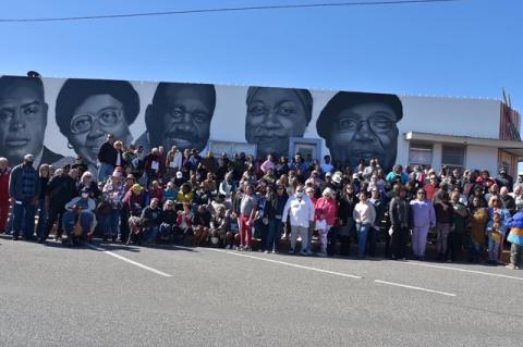 Elgin residents gather together in celebration of the newly revealed mural dedication. Portraits from left to right: Harvey Westbrook, Annie Lee Haywood, S.H. McShan, Dorothy McCarther, Monty Joe Thomas. Photo by Sonia Browder