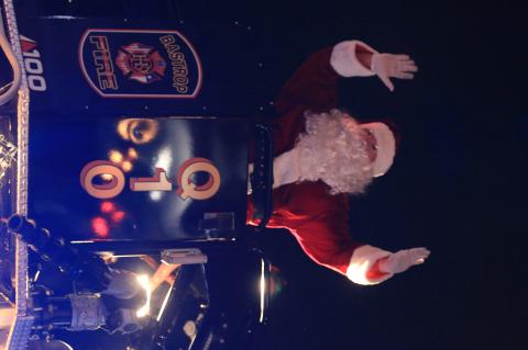 Santa Claus himself makes an appearance at Bastrop’s Lighted Christmas Parade. Photo by Colin Guerra