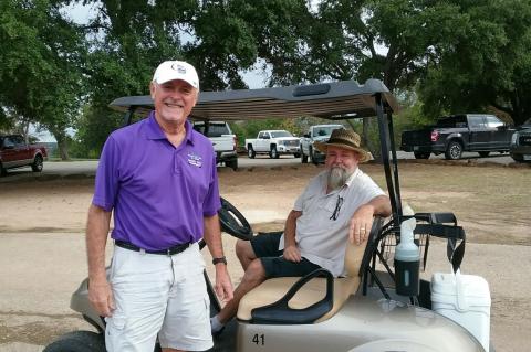 Johnny Klemm (left) and Mike Brune (right) volunteer on Sept. 16 during the second annual Relay For Life of Elgin Golf Tournament. Photo courtesy of Ruth Hyatt