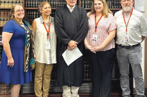 Brandy Martin, Esther Montoya, Judge Benton Eskew, Sabrina Bass and Chris Ligon, now part of the CASA family. Photo courtesy of Rita Coduto