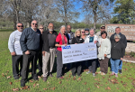 LCRA representatives present a $25,000 grant to Smithville officials for new signs at Vernon L. Richards Riverbend Park. The grant is part of LCRA’s Community Development Partnership Program. Pictured are, from left, Jack Page, Smithville director of public works and utilities; Robert Tamble, city manager; Brenda Page, Smithville Jamboree; Bill Gordon, city council member; Jill Strube, director of economic development and grants administration; Rick Arnic, LCRA Regional Affairs representative; Margaret D. “