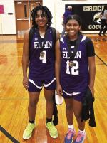 Elgin High School girls varsity basketball senior Jaylan Roberson (left) and sophomore teammate Trinity Martinez (right) happily pose together Nov. 18 at the Crockett Tournament in Austin after being selected to the all-tournament team. Photo courtesy of Elgin ISD