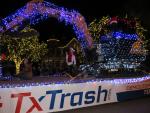 TX Trash floats through Main Street in Elgin Dec. 3 for the Elgin Lighted Parade. The entrant won first place in parade awards. Photo by Fernando Castro