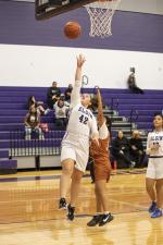 Alexia Perez converts a layup off a beautiful assist from one of her teammates. Photo by Erin Anderson