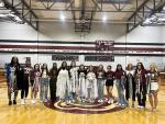 The Bastrop High School varsity volleyball team gathers together on Sept. 8 prior to the Lady Bears’ district home match vs. Pflugerville High School to celebrate as part of Homecoming week. Photo courtesy of Morgan Rollins