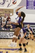 Josephine Jackson prepares to deliver a powerful spike for the Wildcats.  Photo by Erin Anderson.