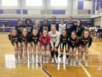 The Bastrop High School varsity volleyball team proudly poses together on Aug. 26 during the Ragin’ Rattler Tournament hosted by San Marcos High School. Photo courtesy of Morgan Rollins